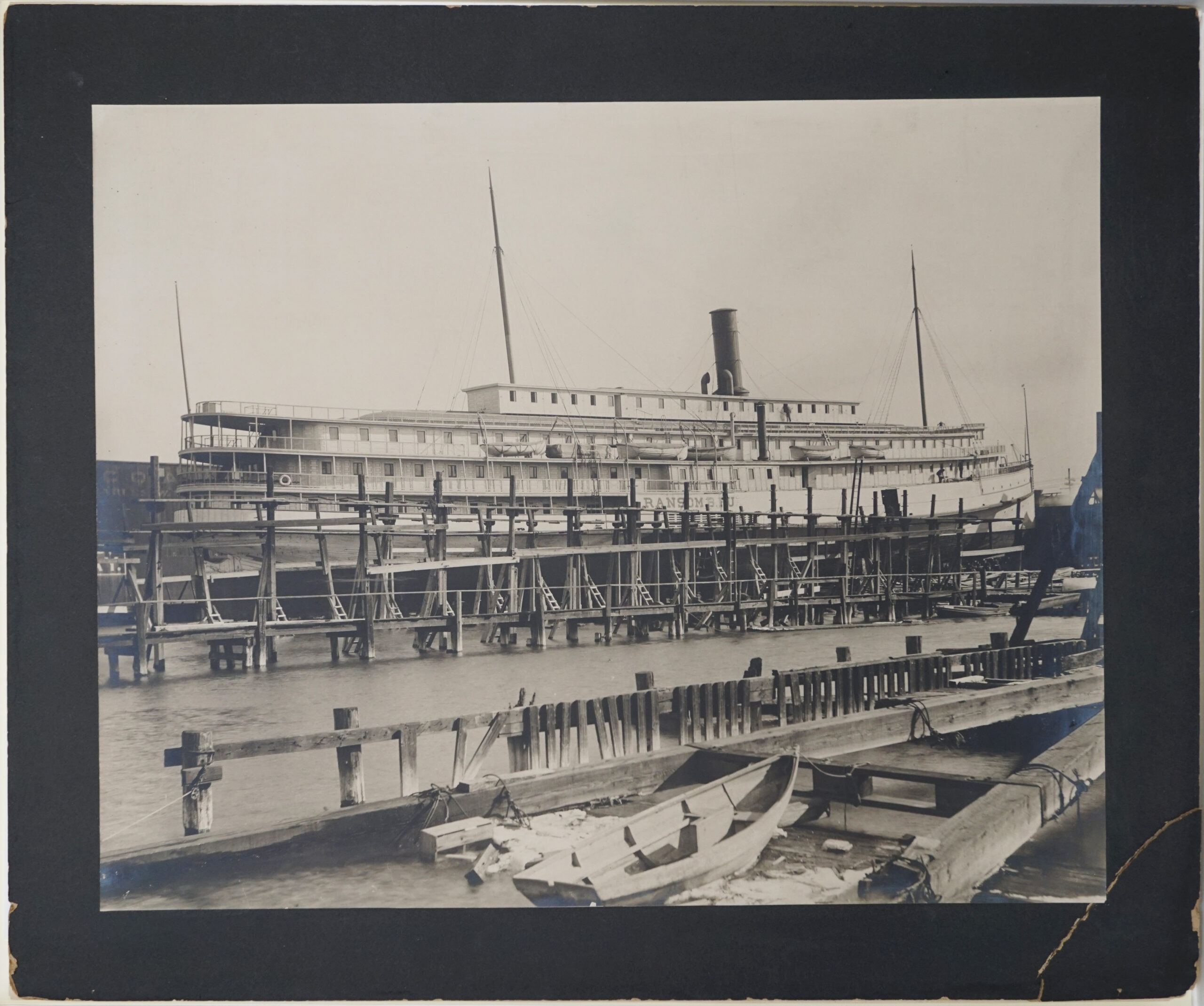 black and white photo of a boat