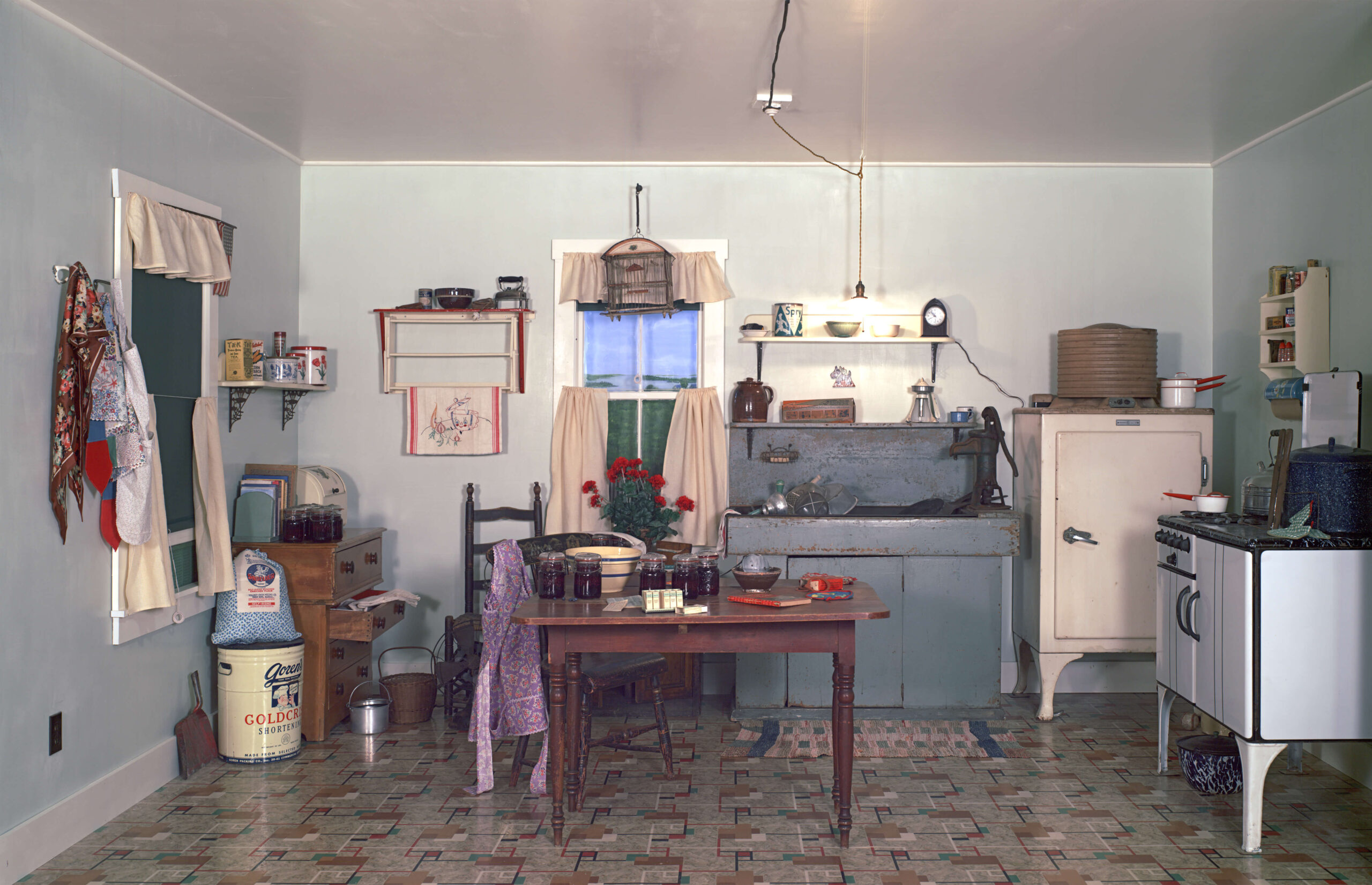 Caption: The World War II-era Summer Kitchen portion of the At Home in Maine exhibit as originally displayed in the museum. Photo by Roy Wells of the Maine State Archives.