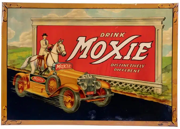 Advertisement sign reading "Drink Moxie/ Distinctively Different" with a man on a horse on a car.