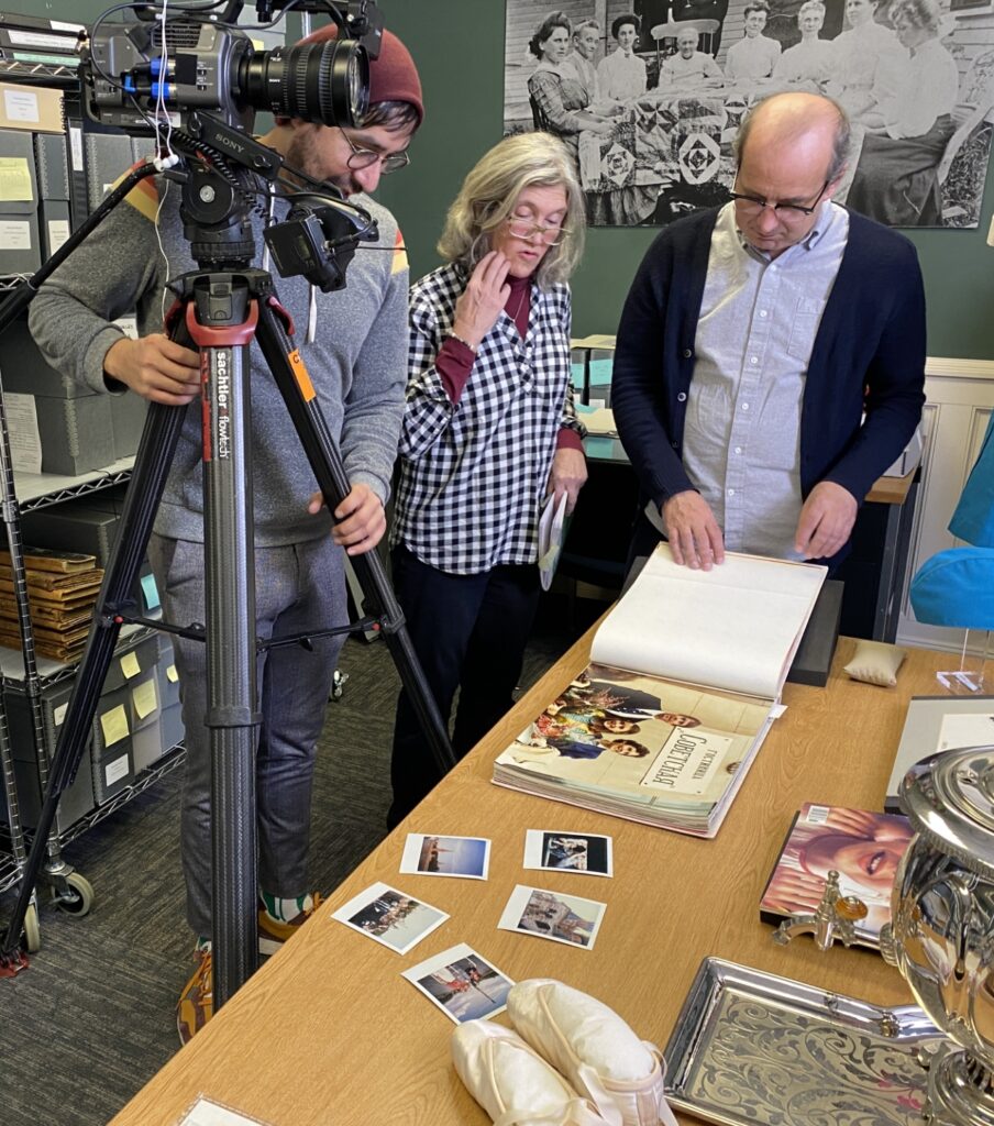 Museum staff documenting collection items