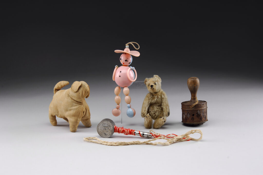 An assemblage of vintage toys from the 'At Home in Maine' exhibit.