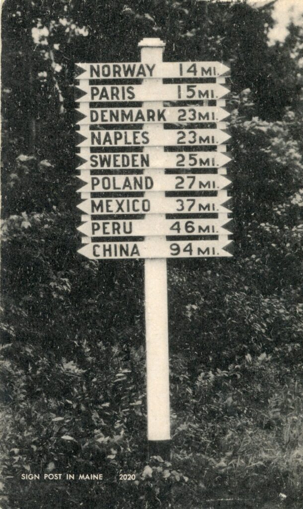 Historic image of the World Traveler signpost